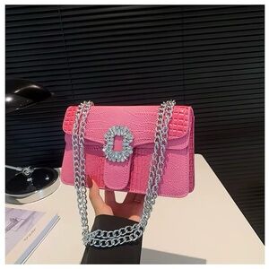 Elegant Pink Croc-Embossed Crossbody Bag with Silver Chain